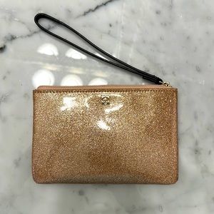Kate Spade pink/ goldish sparkling wristlet